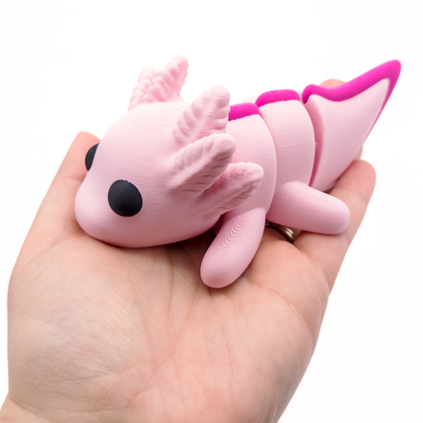 3D printed large axolotl fidget creature in palm of hand