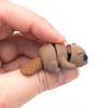 3D Printed Mini Beaver Fidget facing away, showing tail, held between fingers