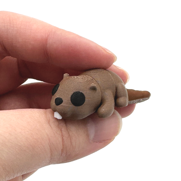 3D Printed Mini Beaver Fidget held in hand between fingers