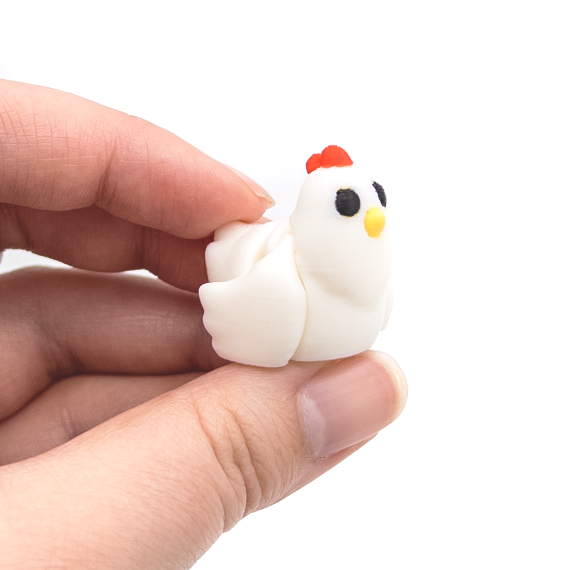 3D printed chicken mini fidget held in hand