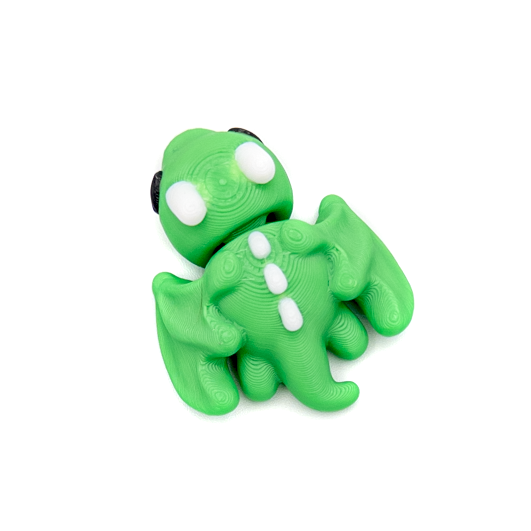 3D printed mini dragon with spread wings fidget creature