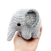 Crochet Amigurumi Elephants in gray being held in hand
