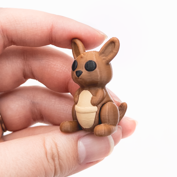 3D printed mini kangaroo fidget creature held in hand