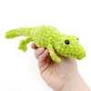 Crochet Amigurumi Lizard in Pistachio held in hand