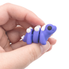 3D printed mini stegosaurus fidget creature held in hand