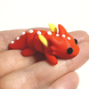 3D printed dragon with wings mini fidget creature held in hand