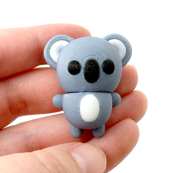 3D printed koala mini fidget creature held in hand