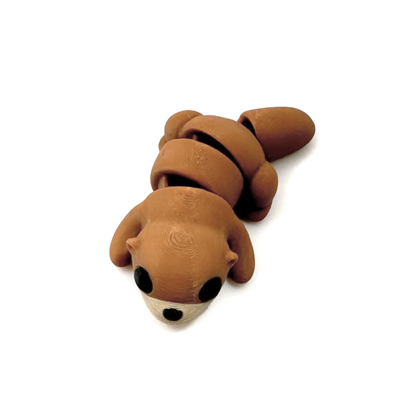 3D printed mini otter fidget creature belly down