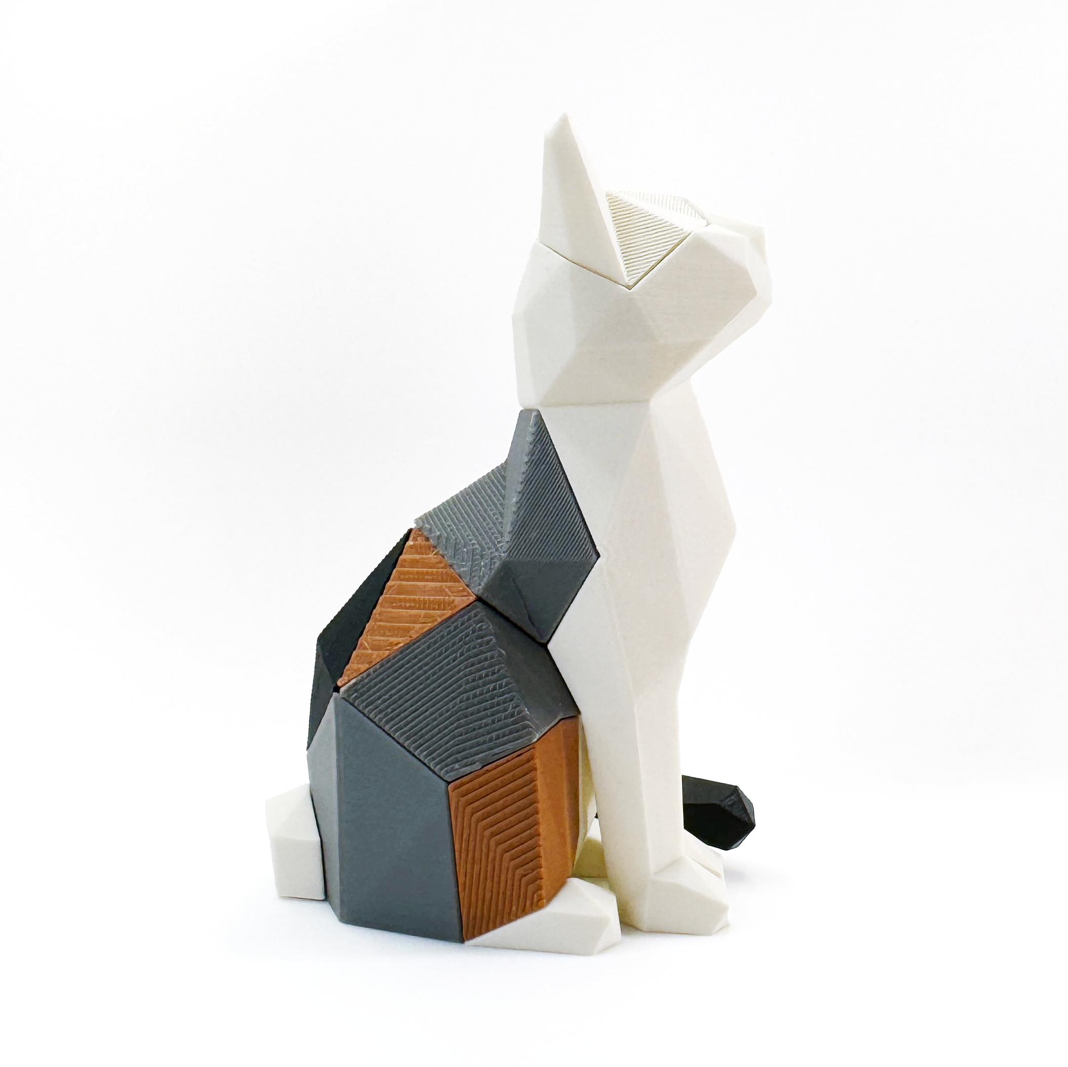 3D printed sitting cat magnet puzzle fully assembled showing right side