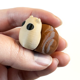3D printed snail mini fidget creature being held