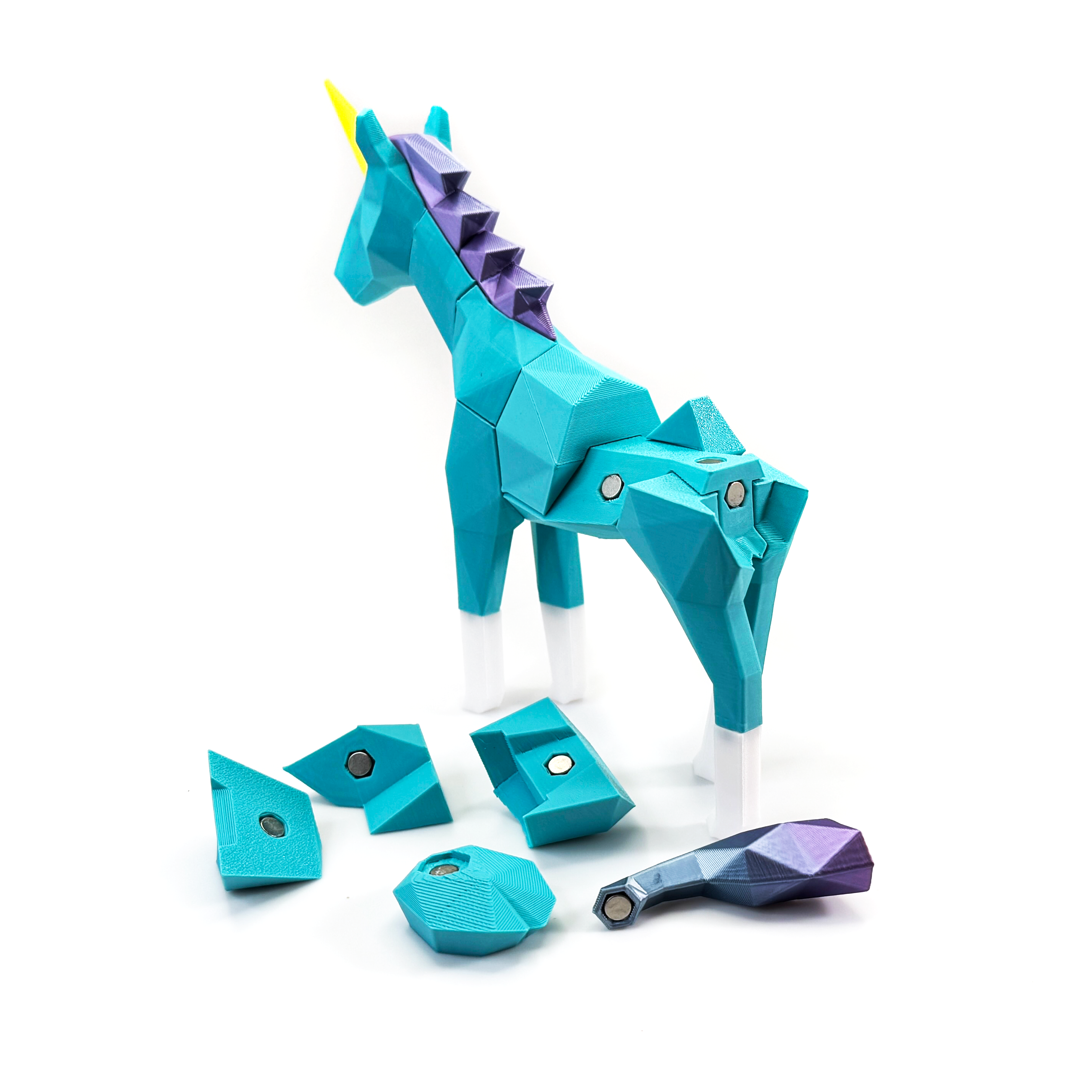 3D printed unicorn magnet puzzle partially disassembled showing magnet connections