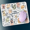 mouse pad with a wireless mouse featuring daily reminders with family friendly language