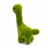 Crochet amigurumi brontosaurus plushie in goblin green