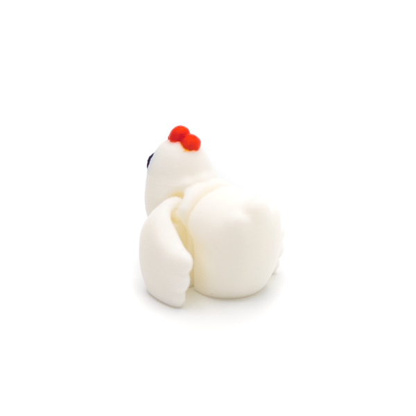 3D printed chicken mini fidget facing away