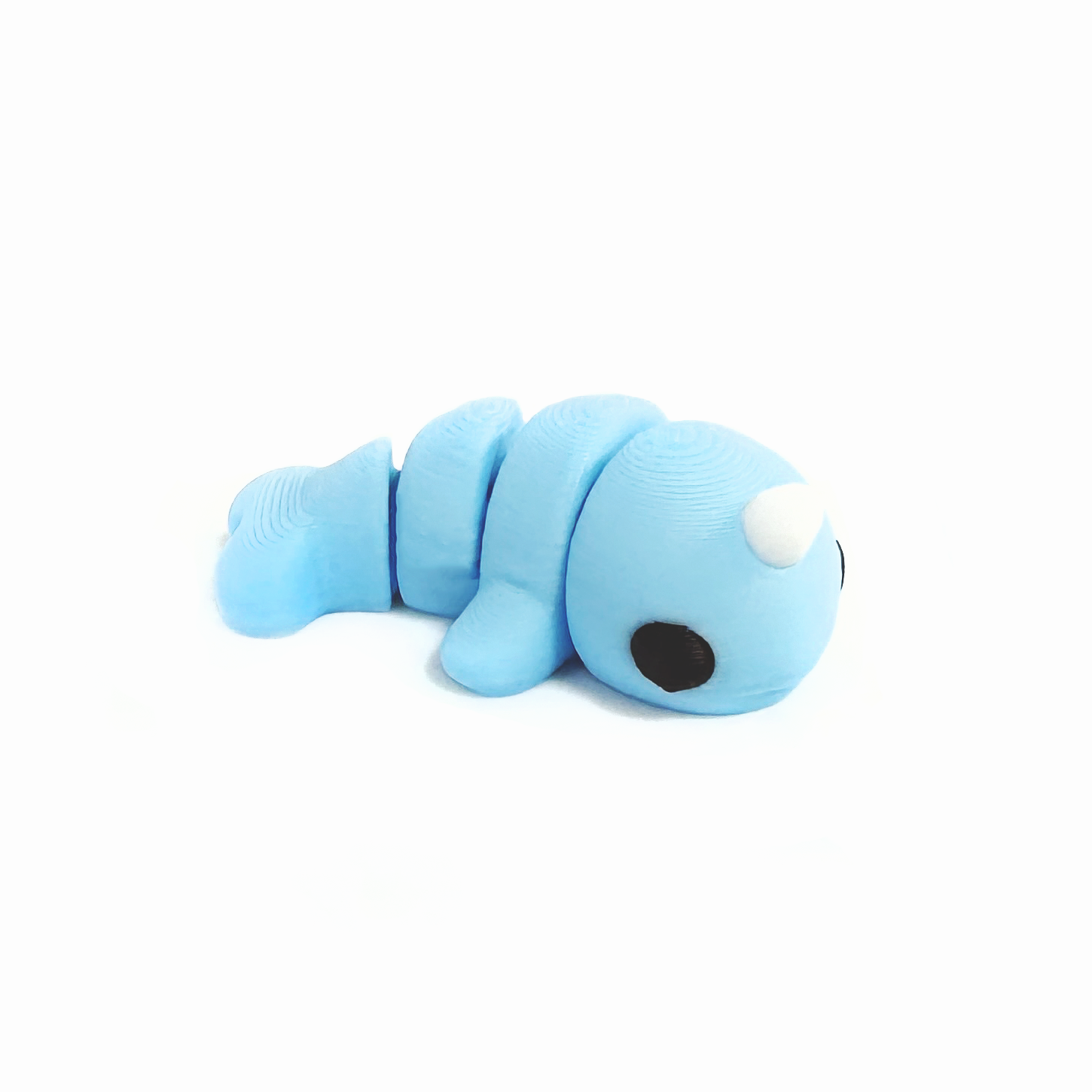3D printed mini narwhal fidget creature