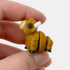 3D printed bison/buffalo mini fidget creature being held