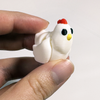 3D printed chicken mini fidget creature being held