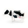 3D printed cow magnet puzzle fully assembled facing sideways to the left