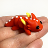 3D printed dragon with wings mini fidget creature being held