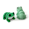 Two 3D printed frog mini fidget creatures - one is facing forward and is bright green with a white under belly, and the other is all light green facing away