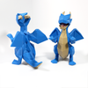 Two 3D printed magnet puzzle dragons fully assembled, one facing away and one facing forward