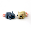 Two 3D printed mice mini fidget creatures - one in dark gray and one in tan