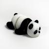 3D printed panda mini fidget creature laying on its belly