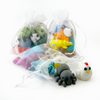 3 pouches of 8 random mini fidget creatures of various colors with a spider and chicken spilling out of front pouch