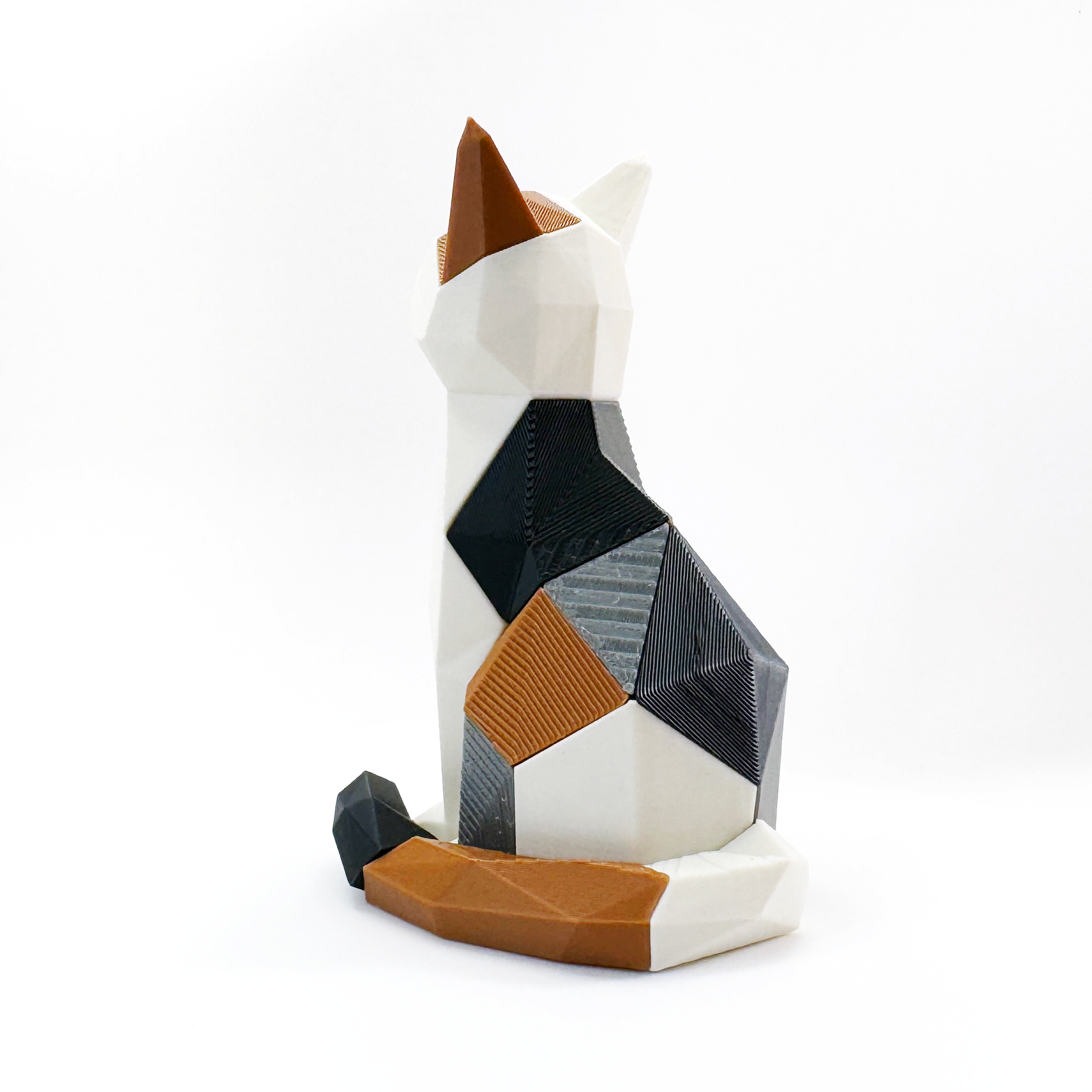 3D printed sitting cat magnet puzzle fully assembled showing back of cat