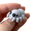 3D printed spider mini fidget creature being held