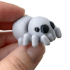 3D printed spider mini fidget creature being held