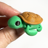 3D printed sea turtle mini fidget creature being held