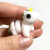 3D printed unicorn mini fidget creature being held