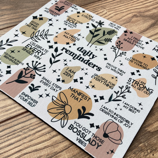 mouse pad featuring daily reminders with family friendly language