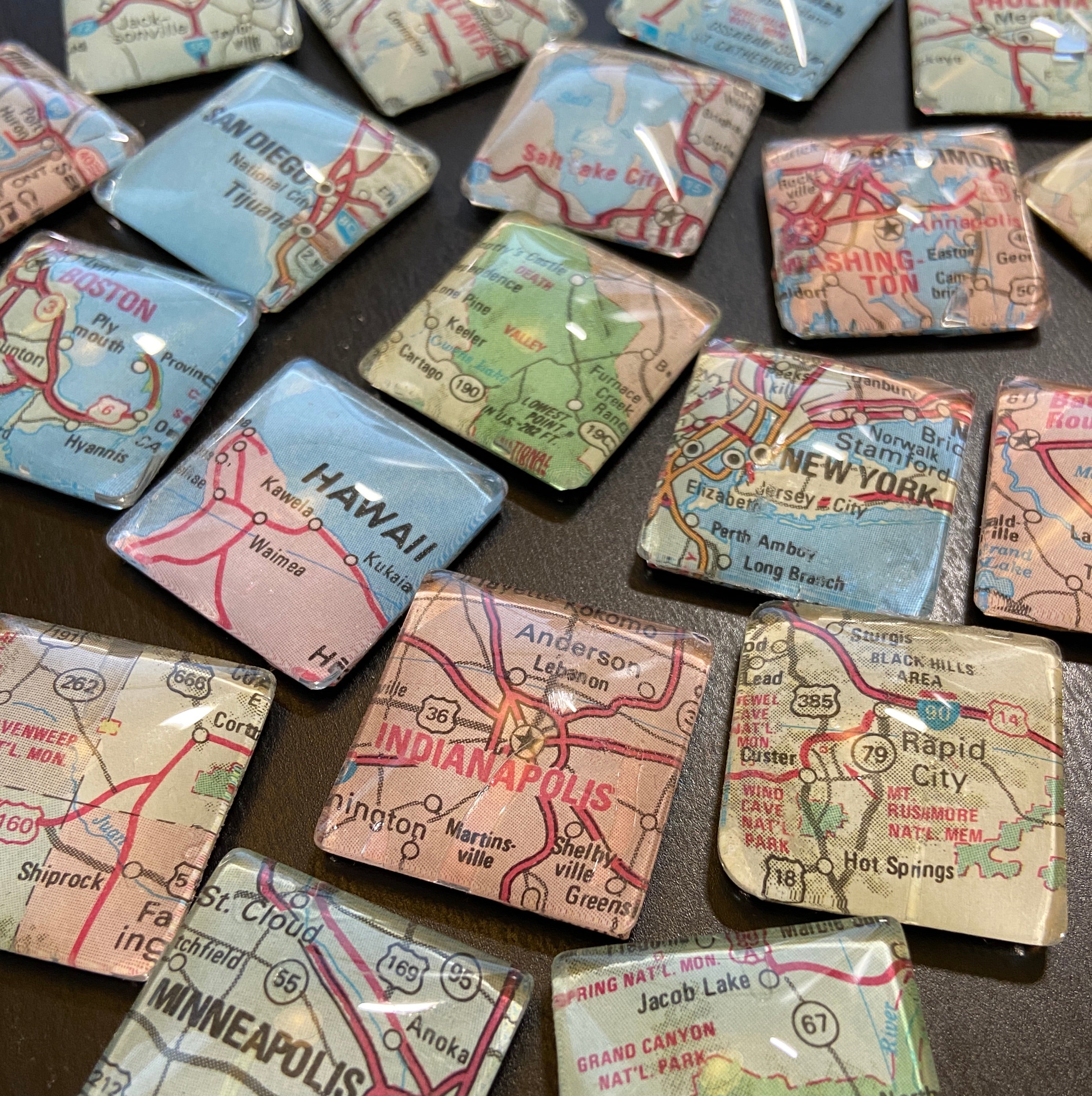 group of 1" square glass dome magnets featuring a variety of map locations